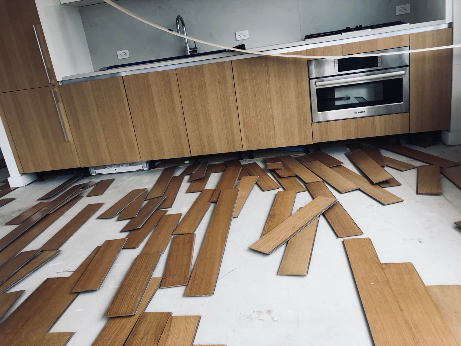Hardwood flooring installation in kitchen